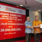 ASM Bayar Klaim Property All Risks ke JNE Sebesar Rp 38 Miliar