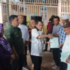 Nelson Serahkan 56 Sertifikat Redistribusi Tanah  Negara HGU di  Desa Motilango